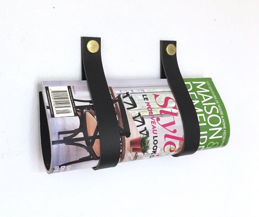 Magazine Holder, black recycled leather and brass wall mounted straps added by Spoak Member