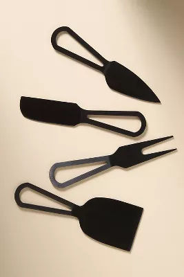 Cheese Knives, Set of 4 added by Spoak Member