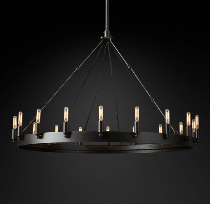 CAMINO VINTAGE FILAMENT ROUND CHANDELIER 38"Starting at$2230$1672RegularMemberRustic in style, simple in form and grandly sized, our hand-forged chandelier designed by industrial blacksmith Jon Sarriugarte makes an elegant statement. Drawing inspiration from early 20th century industrial fixtures, it's built of stout angle iron.SHOP THE ENTIRE COLLECTIONVIEW IN-STOCK OPTIONS FINISH OPTIONSLacquered Burnished BrassIronDETAILSDIMENSIONSINSTALLATION INSTRUCTIONS added by Kate Albee