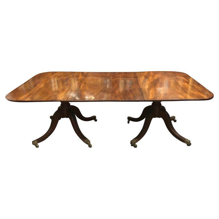19th C. Mahogany Double Pedestal English Regency Dining Table with Brass Casters | David Skinner Antiques added by Serena Finnerty