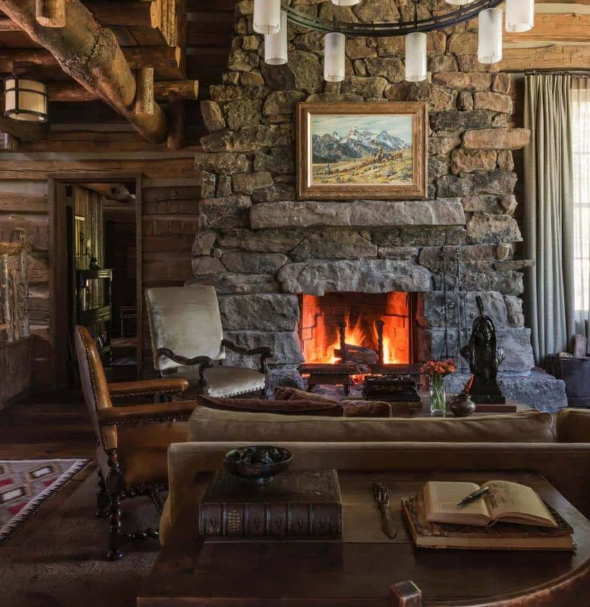 26 Stone Fireplaces For Ultimate Coziness - DigsDigs added by Carolyn Sciucco