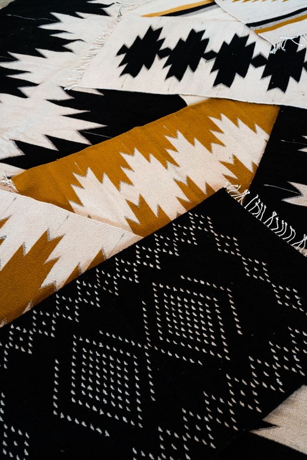 Lluvia Handwoven Mexican Rug | Noir + Natural - Nakawe Trading added by sarah spagnola